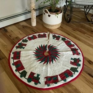 Gorgeous  stitched Christmas tree skirt $50